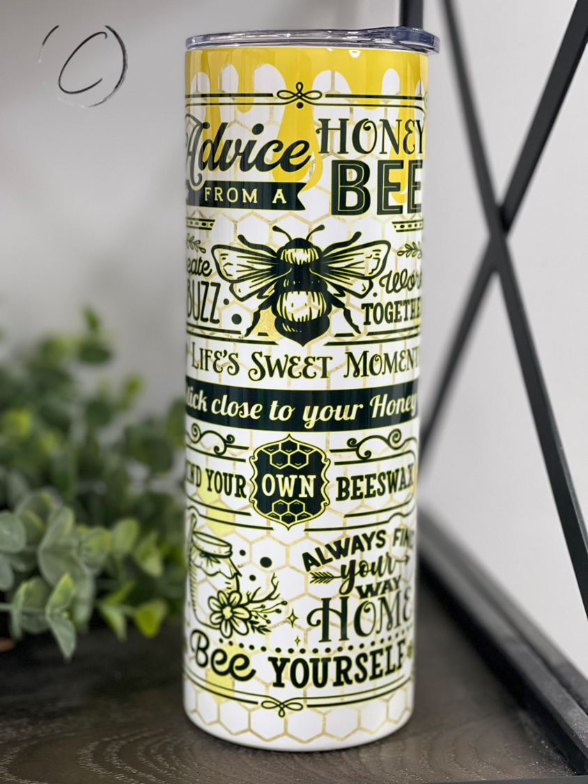 Advice From A Honey Bee 20oz Skinny Tumbler with a vibrant full wrap design, featuring a reusable straw.