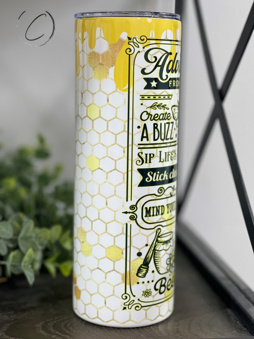 Advice From A Honey Bee 20oz Skinny Tumbler with a vibrant full wrap design, featuring a reusable straw.