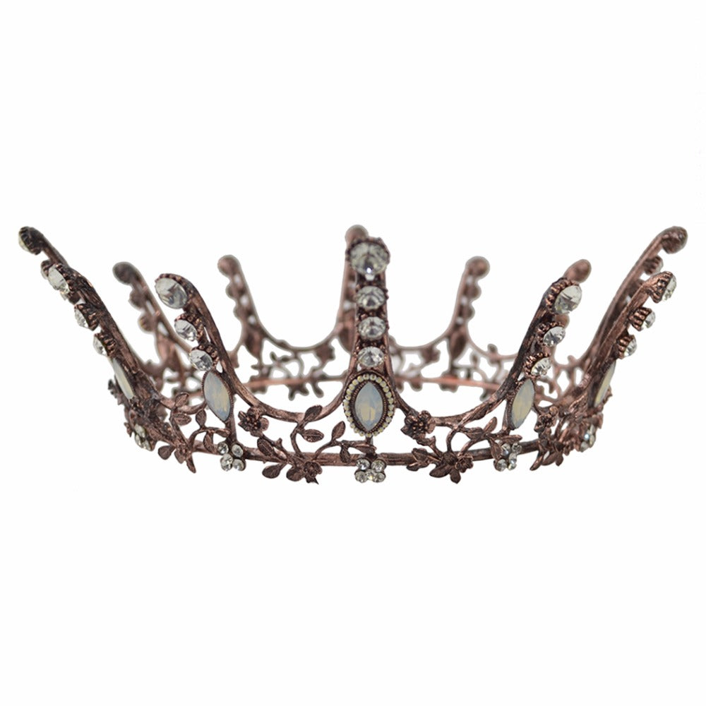 Aggressively Rosy Crown Tiara in rose gold with faux opal accents, designed to resemble skyscrapers, perfect for royal occasions.