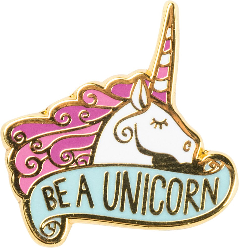 A colorful unicorn enamel pin on a gift card featuring an inspirational quote about being yourself.