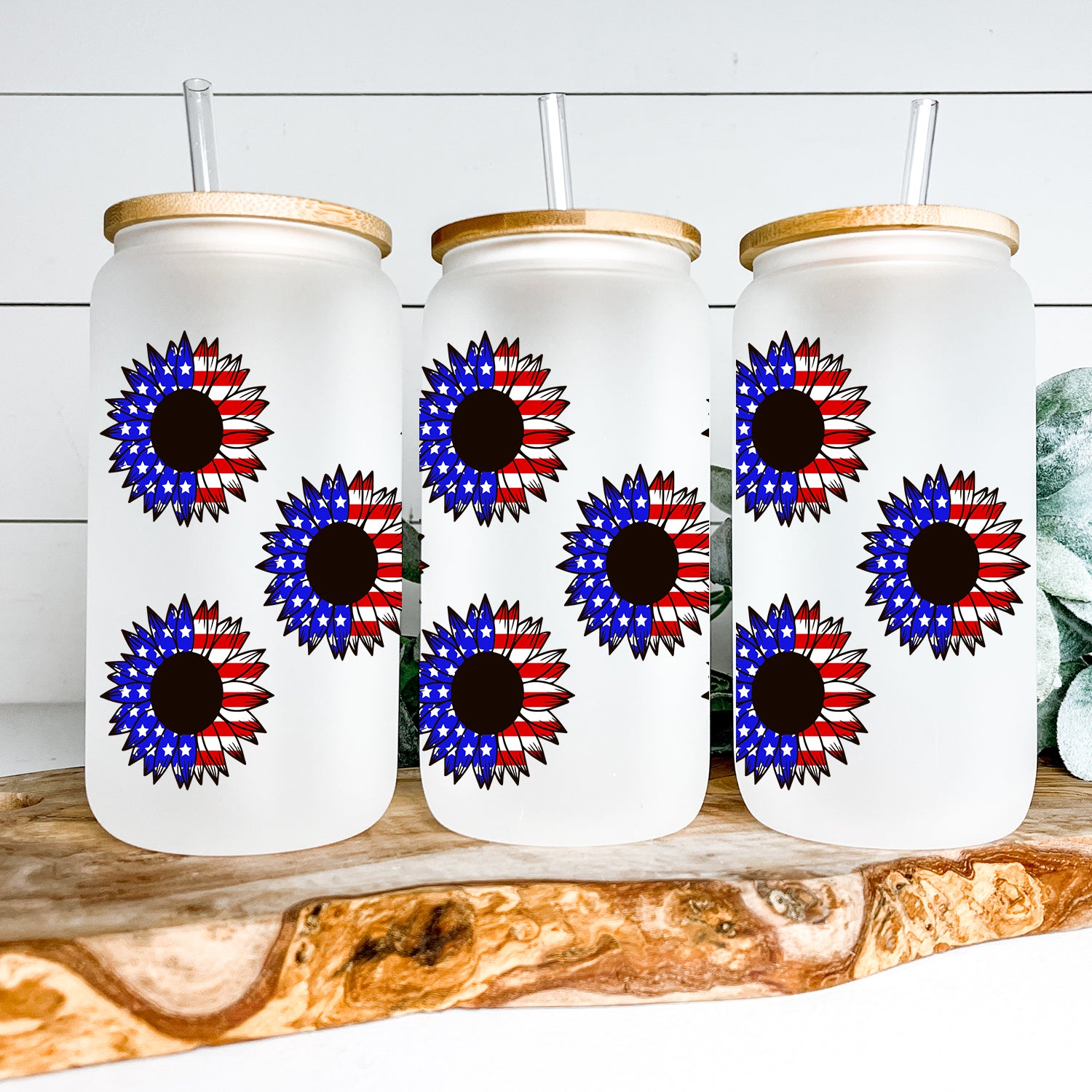 American Sunflower Glass Can Tumbler with bamboo lid and clear straw, showcasing frosted glass design.