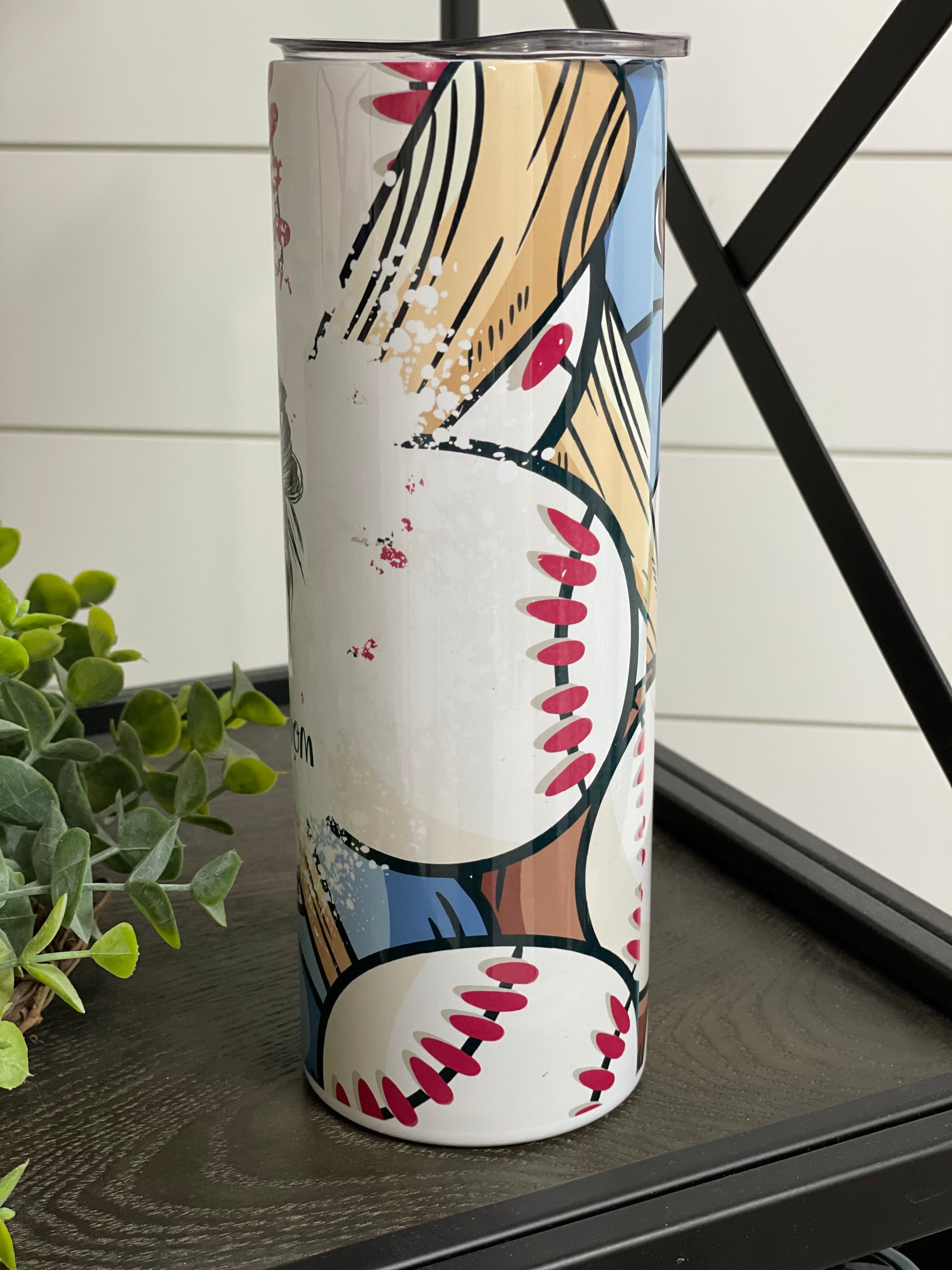 A stylish 20oz skinny tumbler featuring a #BaseballMom design, perfect for hydration at games or daily use.