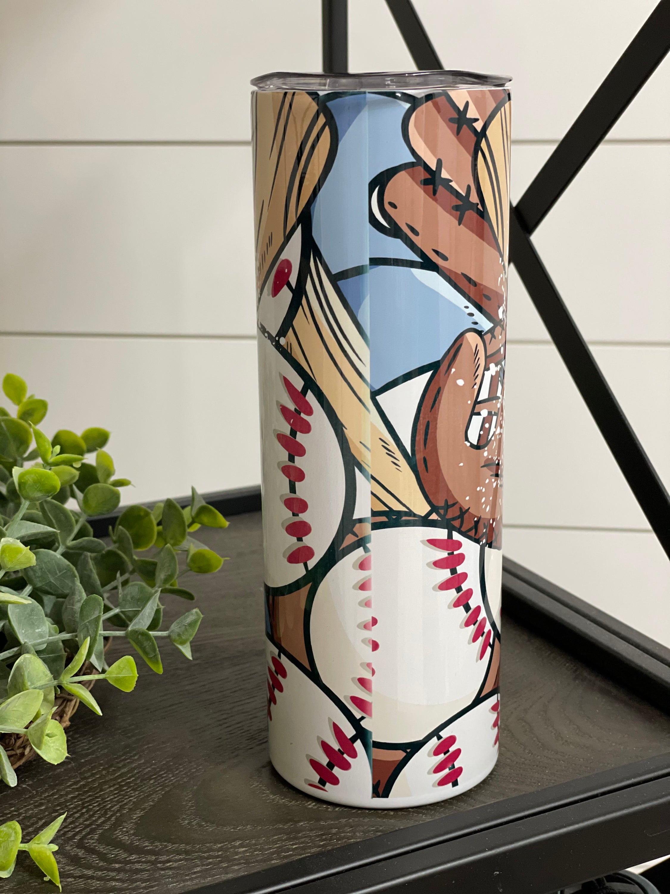 A stylish 20oz skinny tumbler featuring a #BaseballMom design, perfect for hydration at games or daily use.