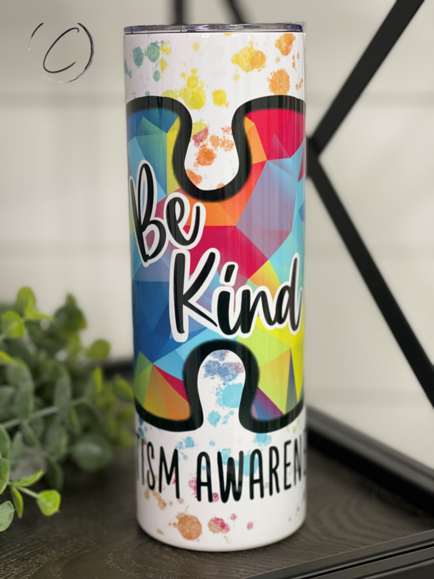 Be Kind Autism Awareness 20oz Skinny Tumbler with vibrant full wrap design and reusable straw.