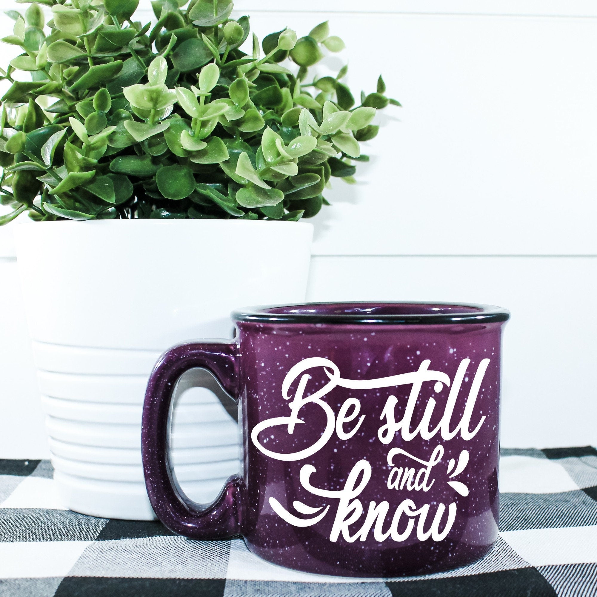 Be Still And Know Campfire Mug with a unique design, perfect for outdoor use and cozy settings.