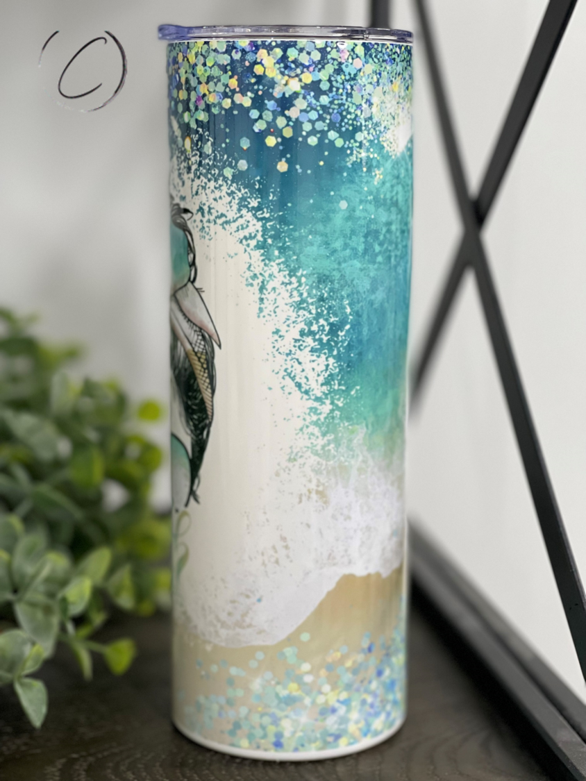 Beach Life Messy Bun 20oz Skinny Tumbler with vibrant beach-themed design and reusable straw.