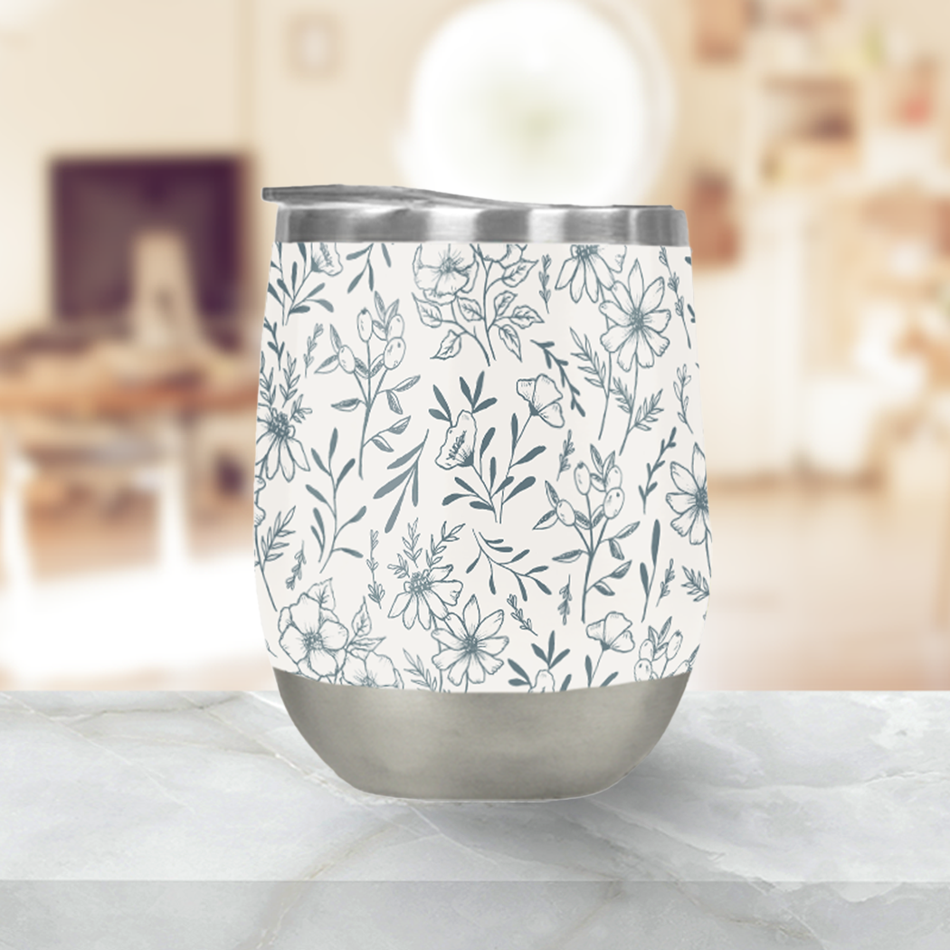 Blue Gray Flower Stemless Wine Tumbler with floral design, perfect for outdoor use.