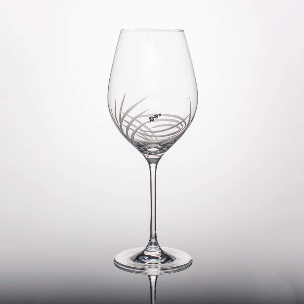 Set of two elegant Breeze Red Wine Glasses with Swarovski crystals in a gift box, showcasing handcrafted designs.