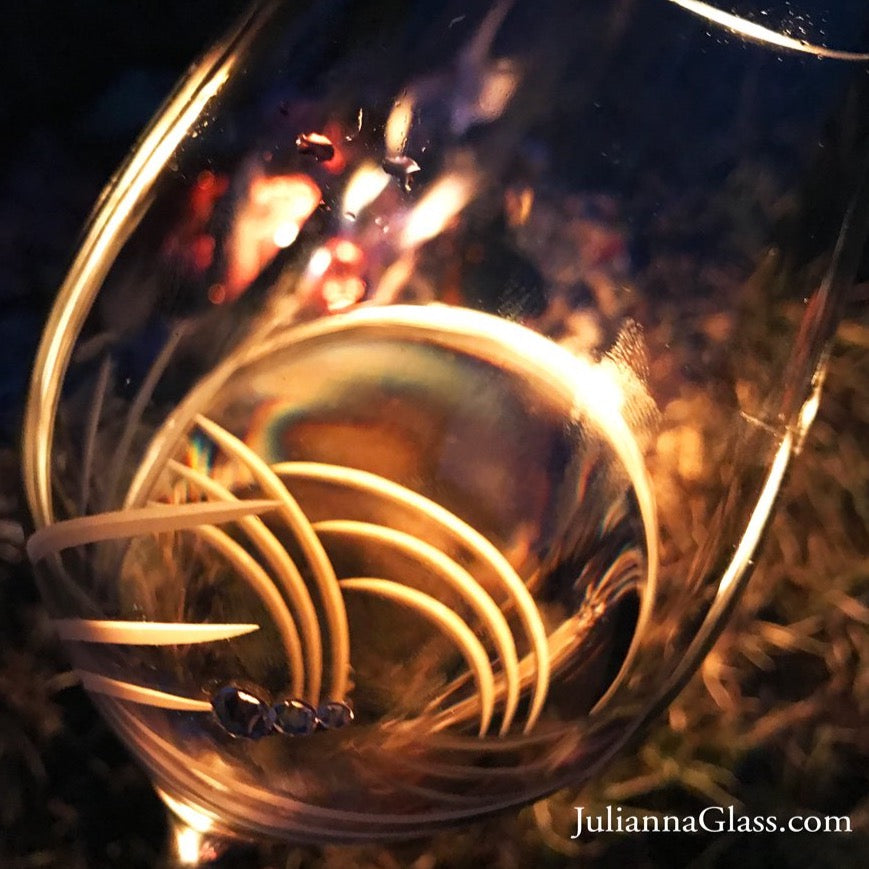 Set of two elegant Breeze Red Wine Glasses with Swarovski crystals in a gift box, showcasing handcrafted designs.