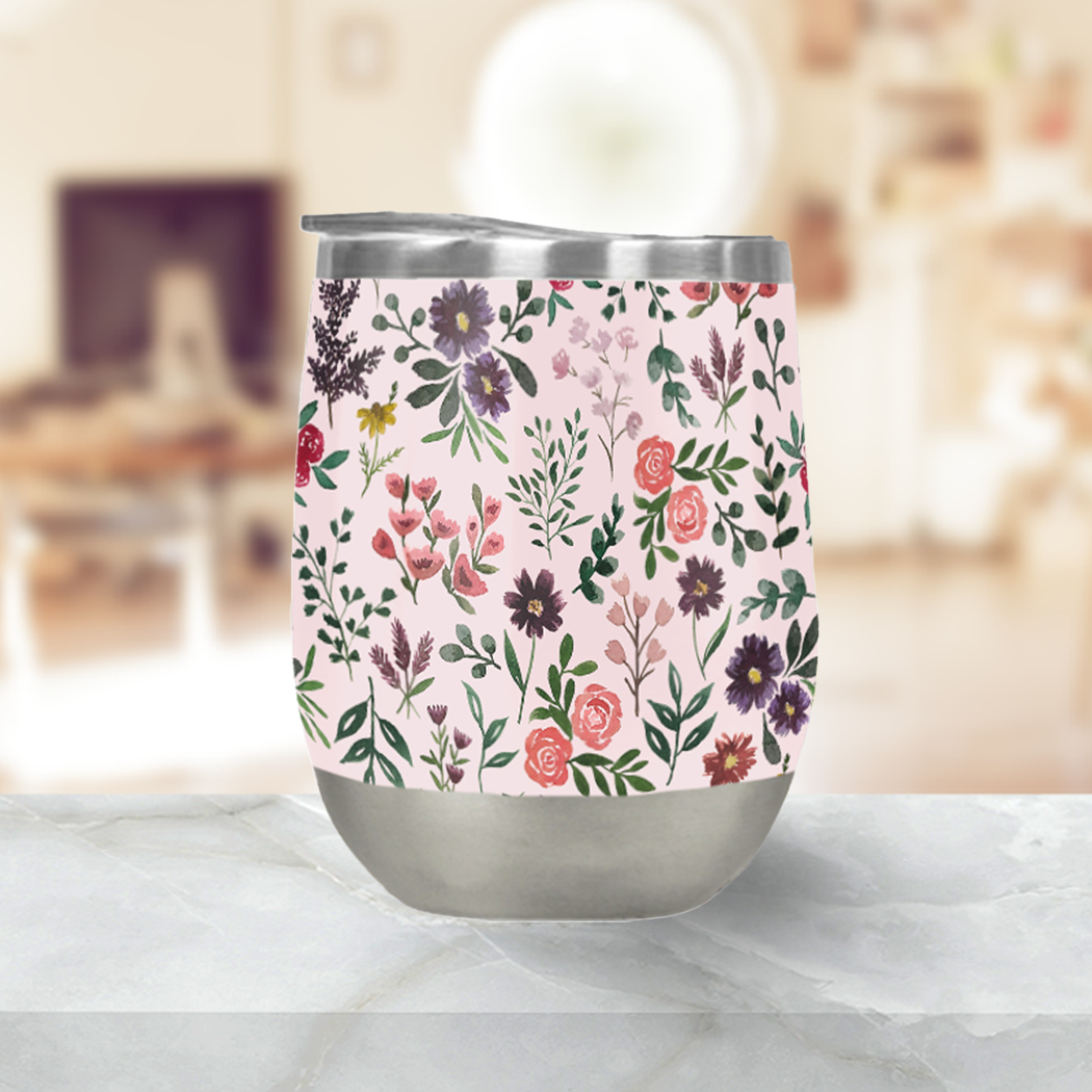 Bright Watercolor Flower Stemless Wine Tumbler in pink with floral design, perfect for outdoor parties and wine lovers.