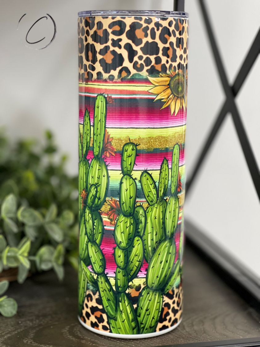 Cactus Serape 20oz Skinny Tumbler featuring a vibrant full wrap design, perfect for hot and cold beverages.