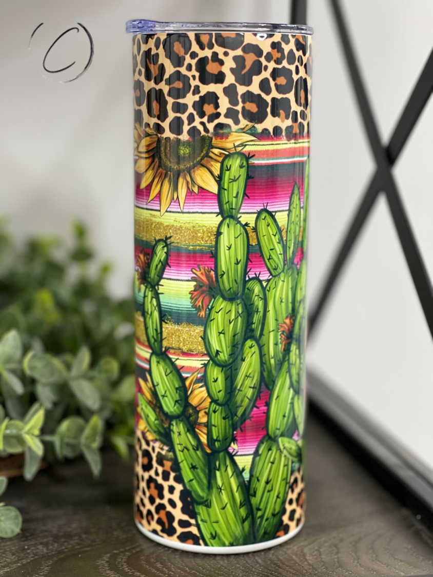 Cactus Serape 20oz Skinny Tumbler featuring a vibrant full wrap design, perfect for hot and cold beverages.