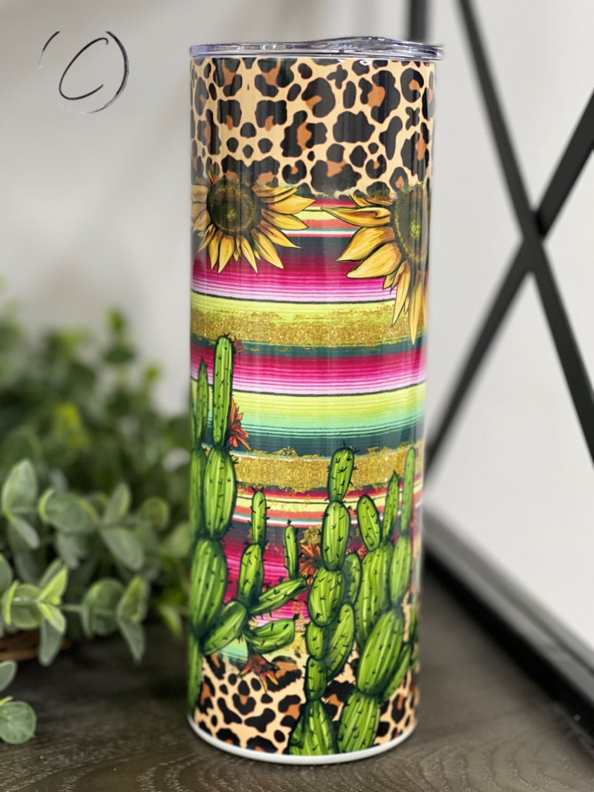 Cactus Serape 20oz Skinny Tumbler featuring a vibrant full wrap design, perfect for hot and cold beverages.