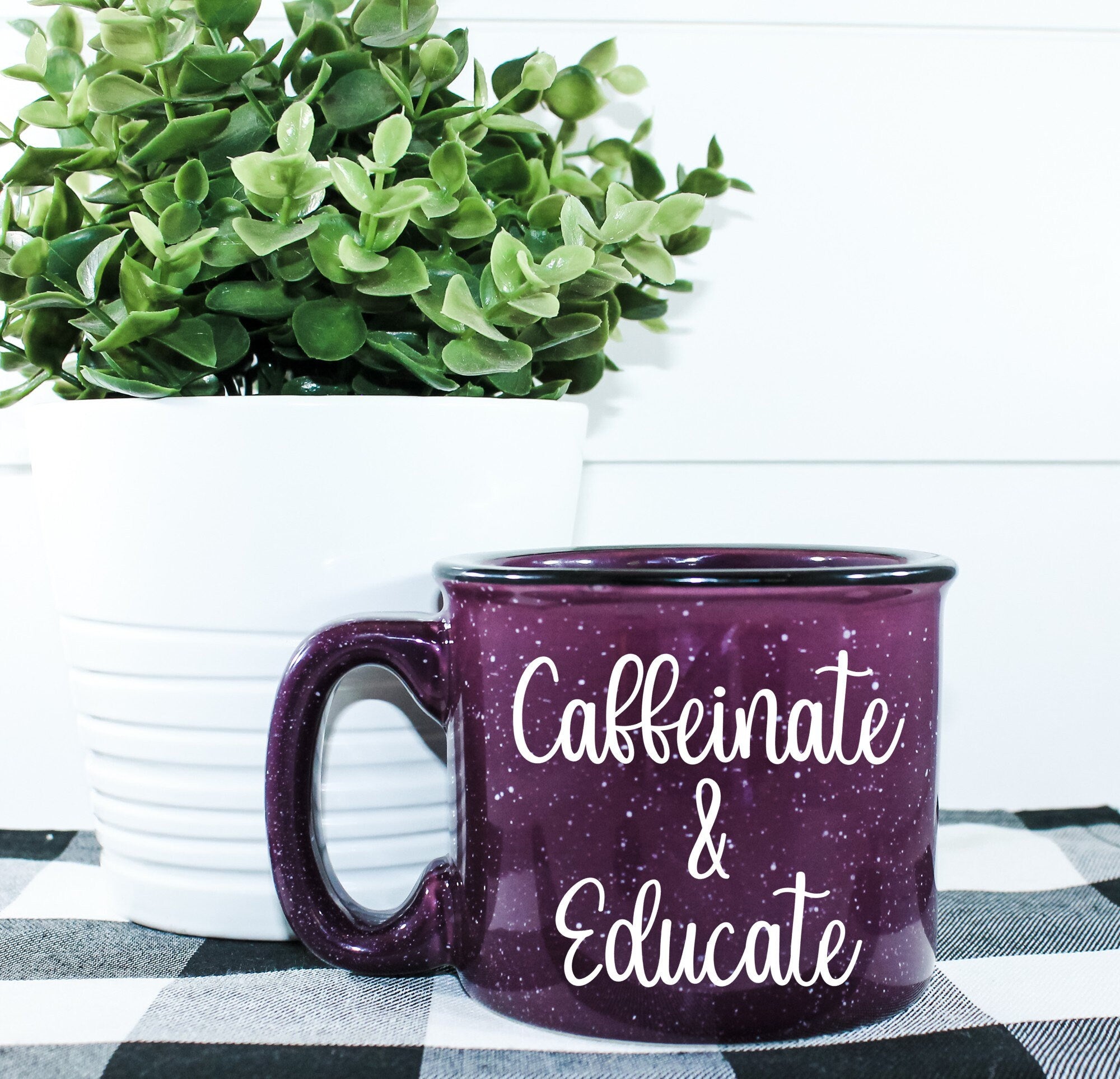 Caffeinate And Educate Campfire Mug with vibrant design, perfect for coffee lovers.