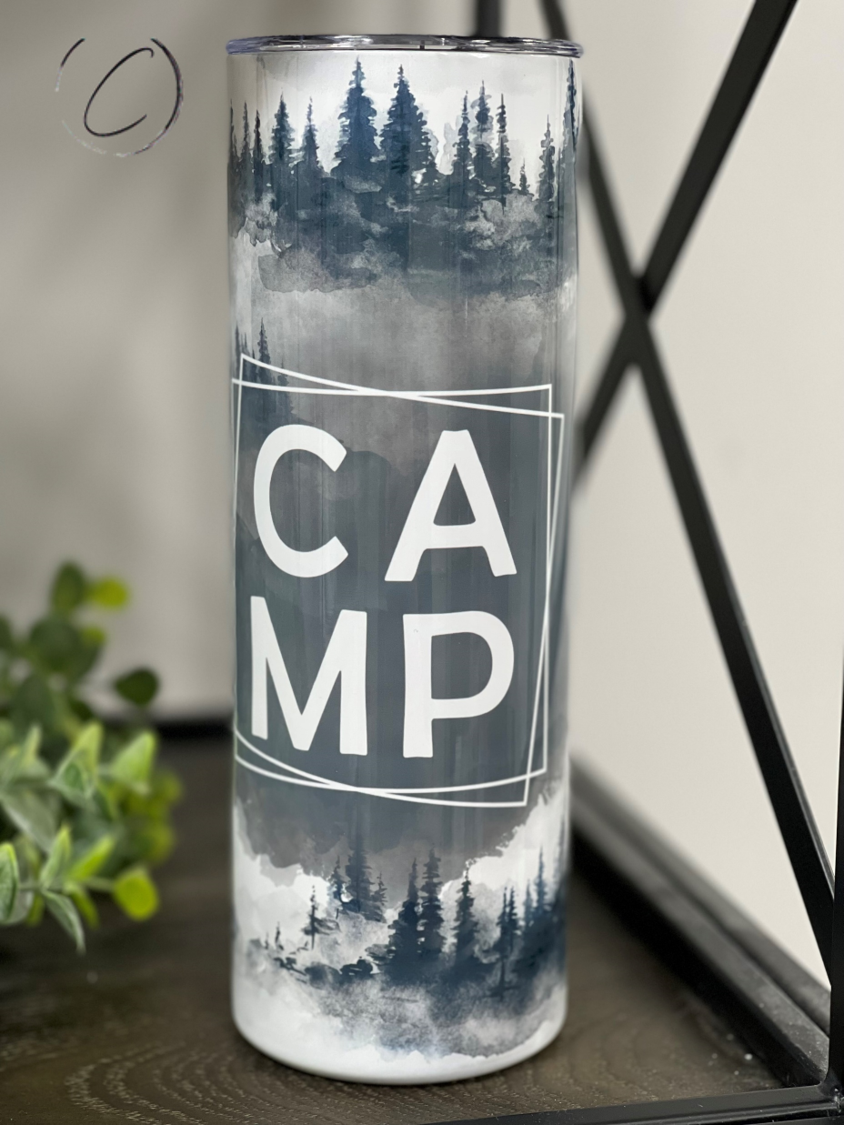 A stylish Camp 20oz Skinny Tumbler featuring a vibrant full wrap design, complete with a reusable straw.