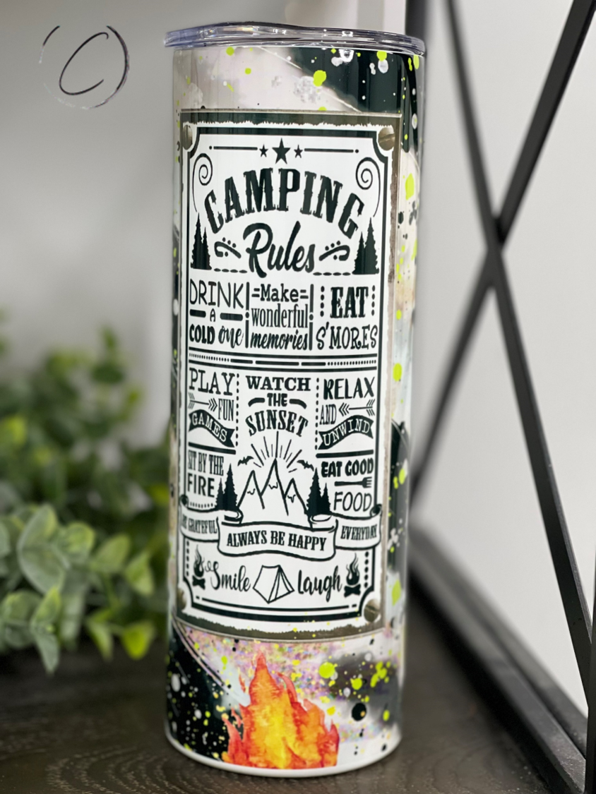 Camping Rules 20oz Skinny Tumbler featuring a vibrant camping-themed design, durable construction, and a reusable straw.