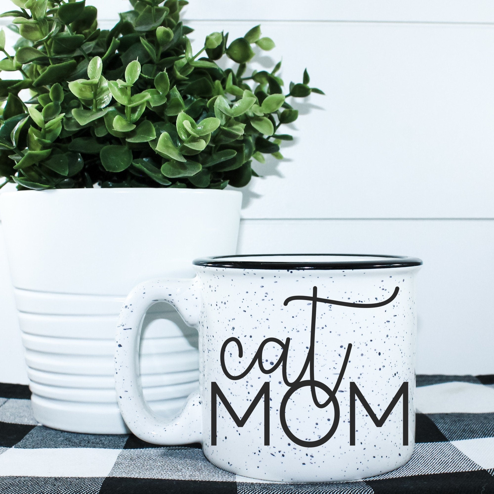 Ceramic Cat Mom Campfire Mug with a unique design, perfect for cat lovers, holding 15 fluid ounces.