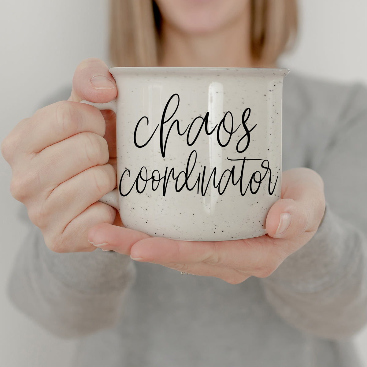 Chaos Coordinator 14.5oz ceramic campfire mug with white sesame glaze and black lettering, designed for daily use.