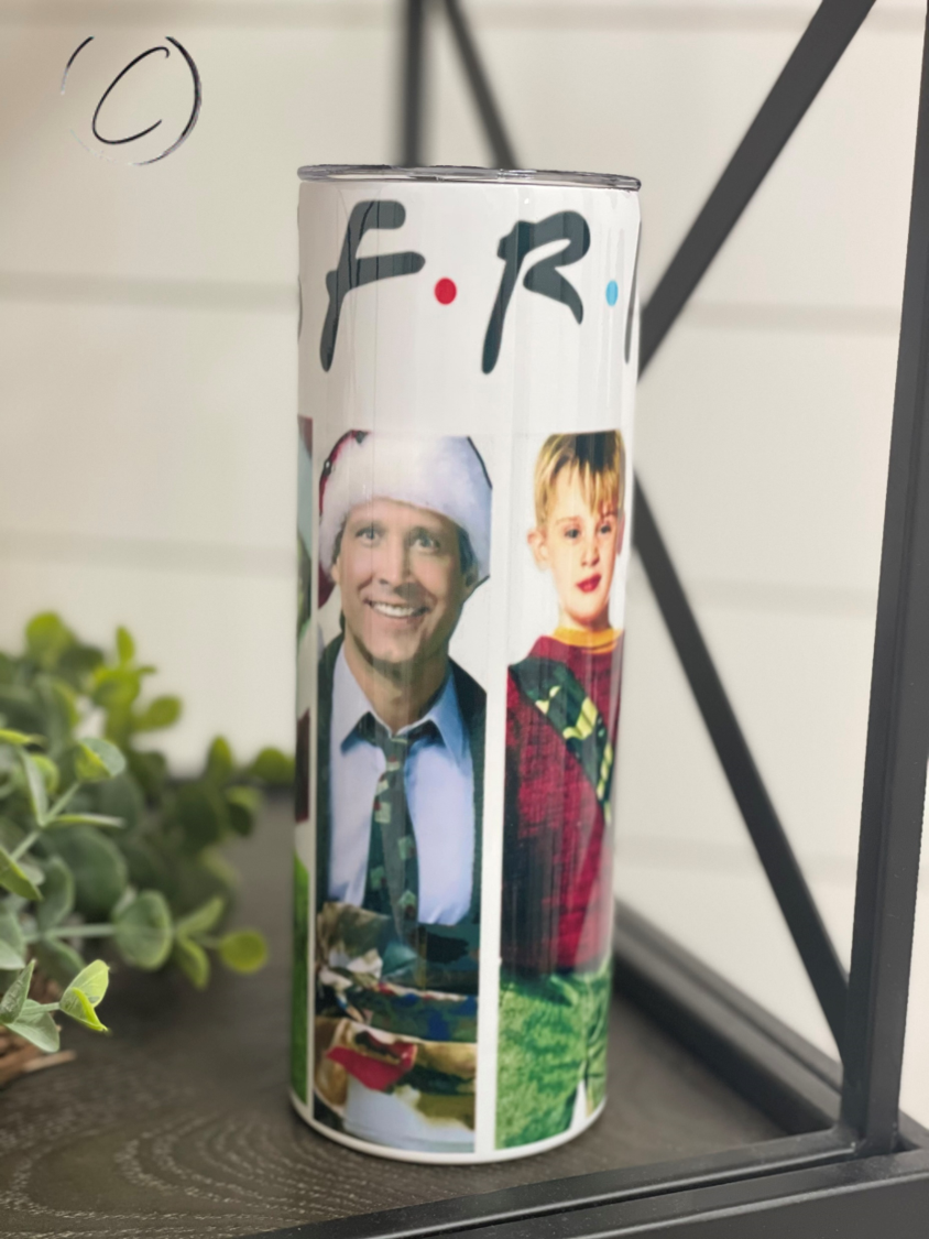 Christmas F*R*I*E*N*D*S 20oz Skinny Tumbler with festive design and reusable straw.