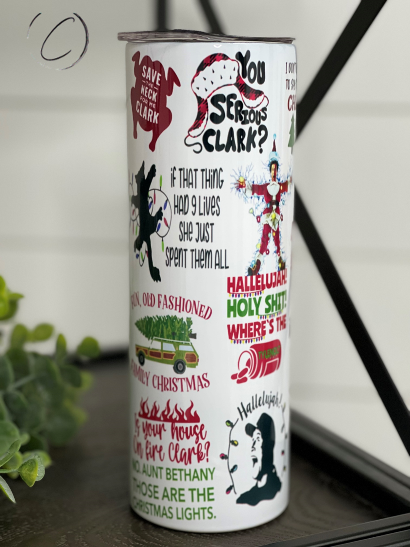 Christmas Vacation 20oz Skinny Tumbler featuring a festive design, reusable straw, and durable construction.