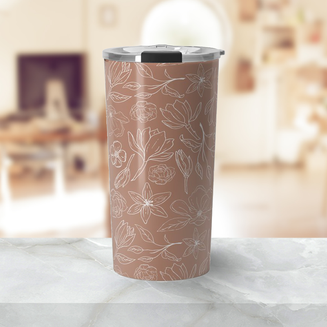 Copper Magnolia Travel Coffee Mug with double-walled stainless steel and vibrant wraparound artwork, perfect for hot or cold beverages.