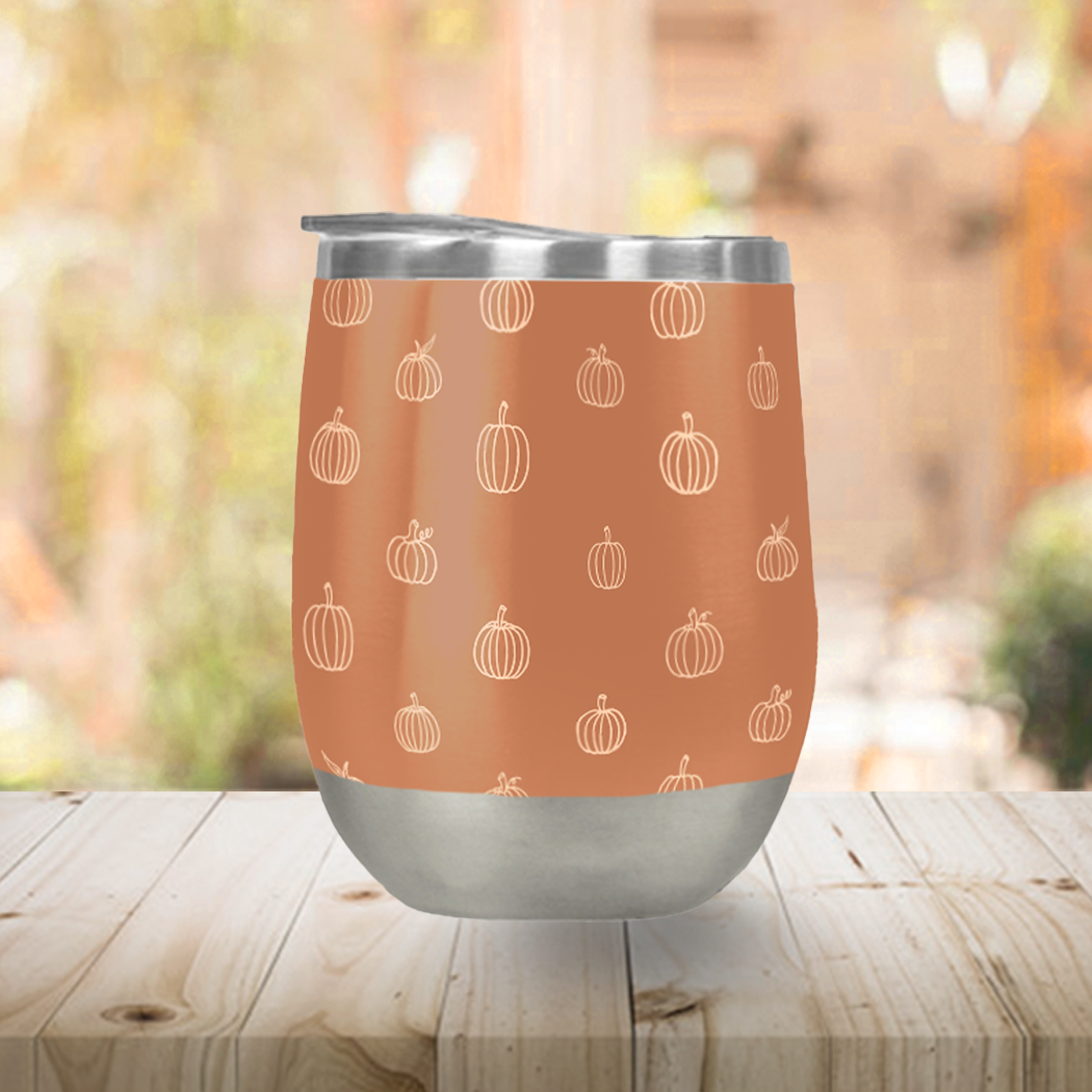 Dark orange pumpkin stemless wine tumbler with double-wall insulation, perfect for outdoor use.