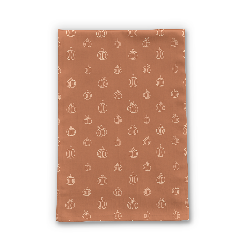 Dark orange pumpkin tea towel made of cotton twill, featuring a vibrant pumpkin design, perfect for kitchen decor.