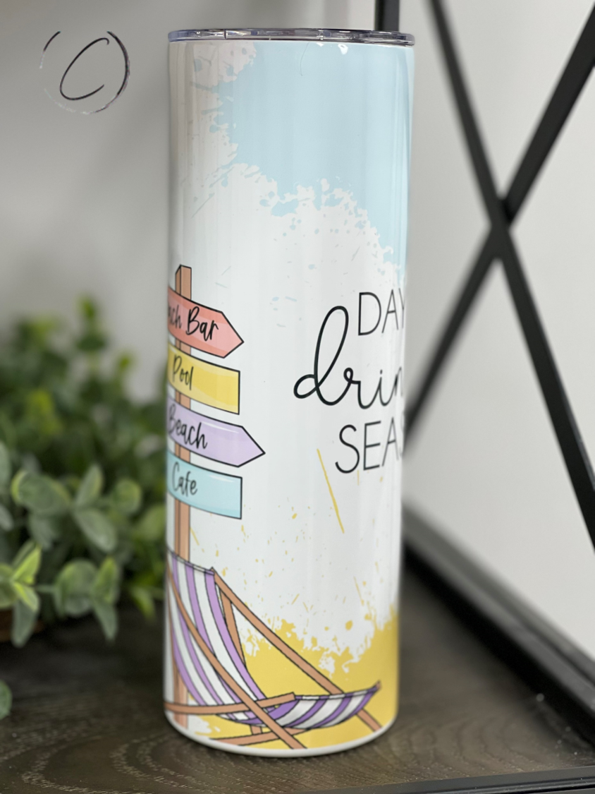 Day Drinking Season 20oz Skinny Tumbler with a vibrant design, reusable straw, and sleek shape, perfect for any beverage.