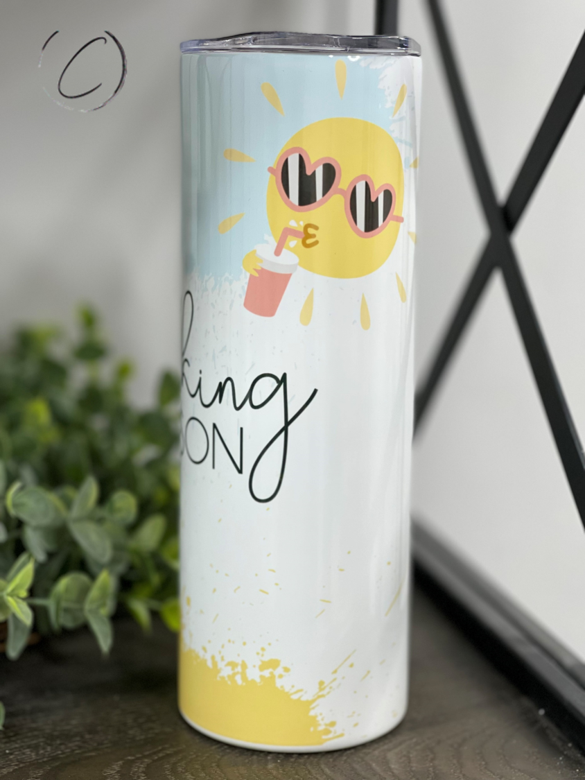 Day Drinking Season 20oz Skinny Tumbler with a vibrant design, reusable straw, and sleek shape, perfect for any beverage.