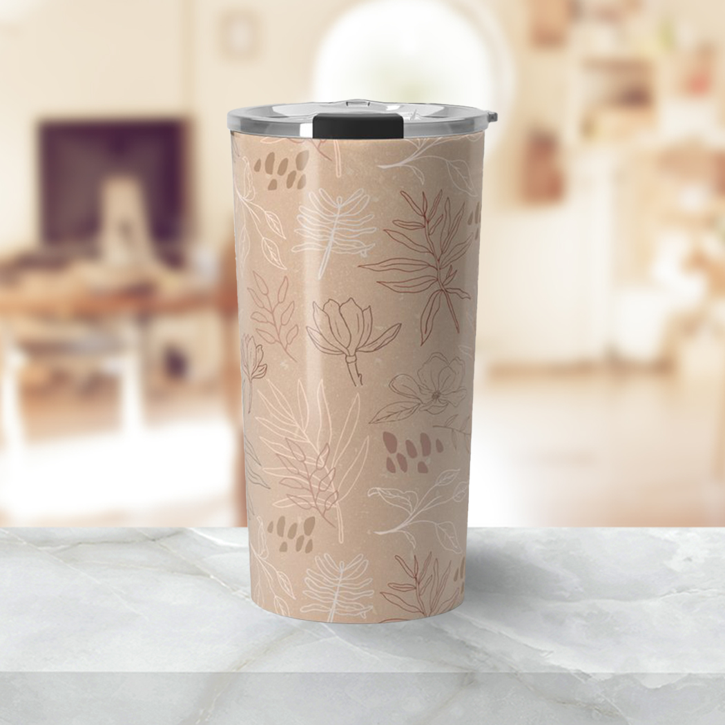 Desert Leaf Travel Coffee Mug in stainless steel with vibrant wraparound artwork, showcasing its durable and stylish design.