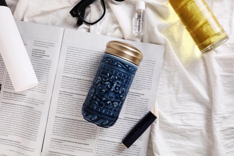 The Determination Tumbler featuring Persimmon Calyx and Jade Dragon patterns, made of tourmaline ceramic with an acrylic resin lid.