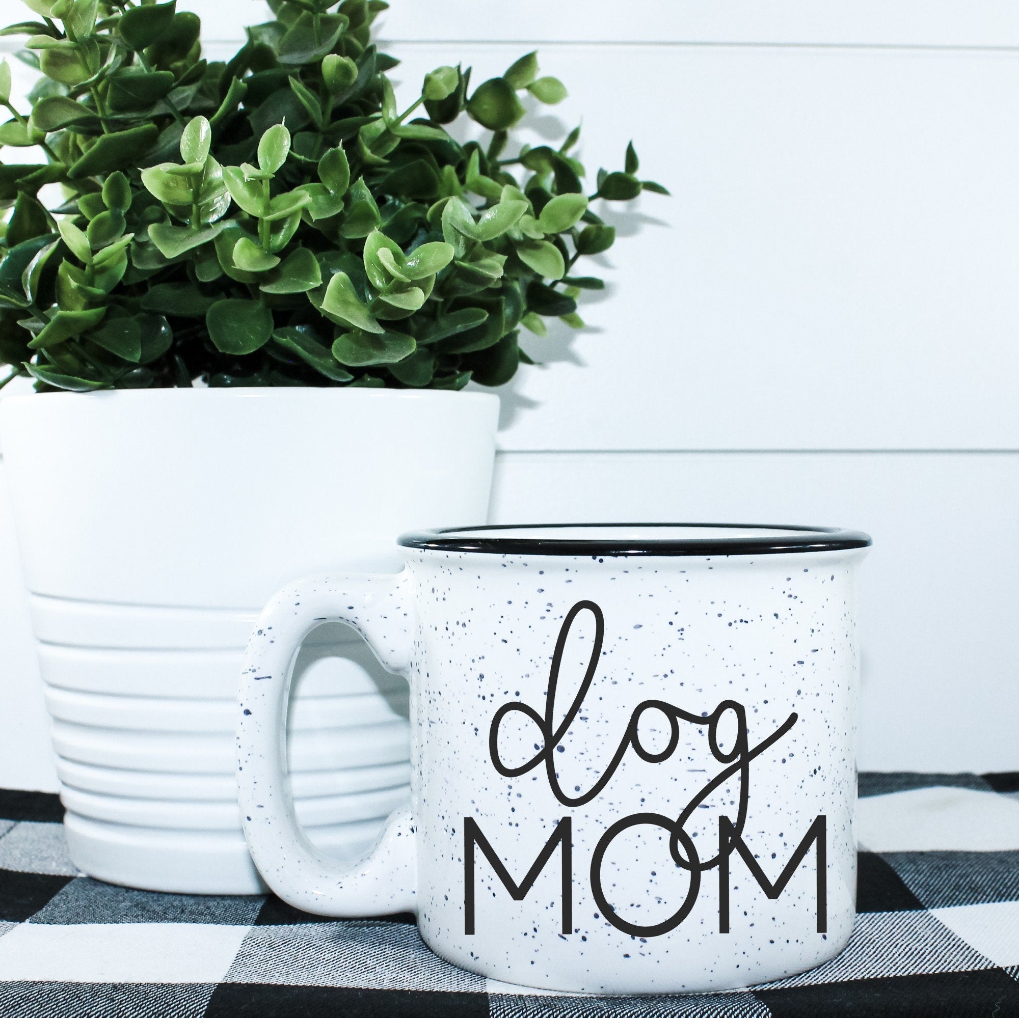 Ceramic Dog Mom Campfire Mug with a unique design, perfect for dog lovers, holding 15 ounces of beverage.