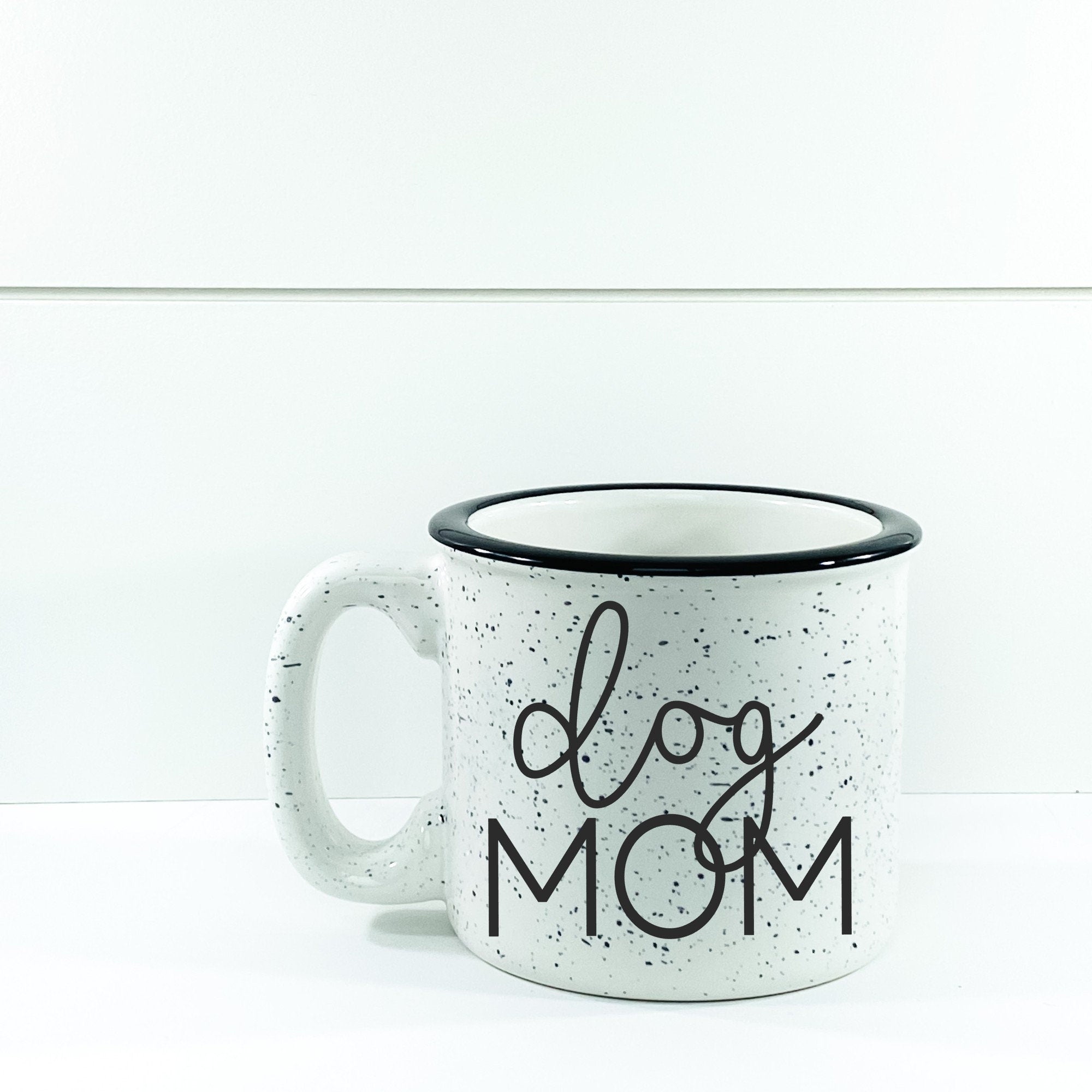 Ceramic Dog Mom Campfire Mug with a unique design, perfect for dog lovers, holding 15 ounces of beverage.