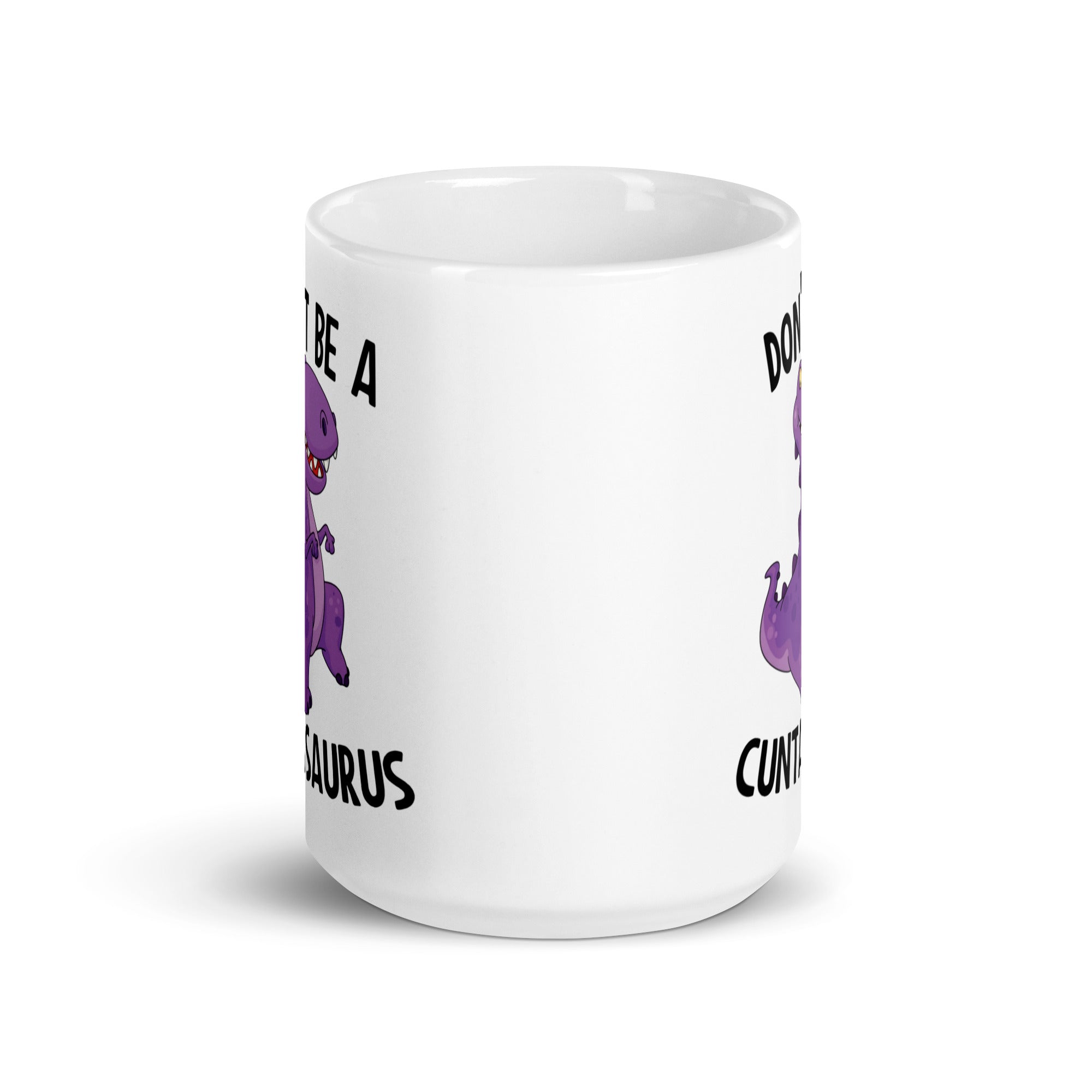 A glossy ceramic mug featuring the humorous phrase 'Don't Be A Cuntasaurus' printed on both sides, available in two sizes.