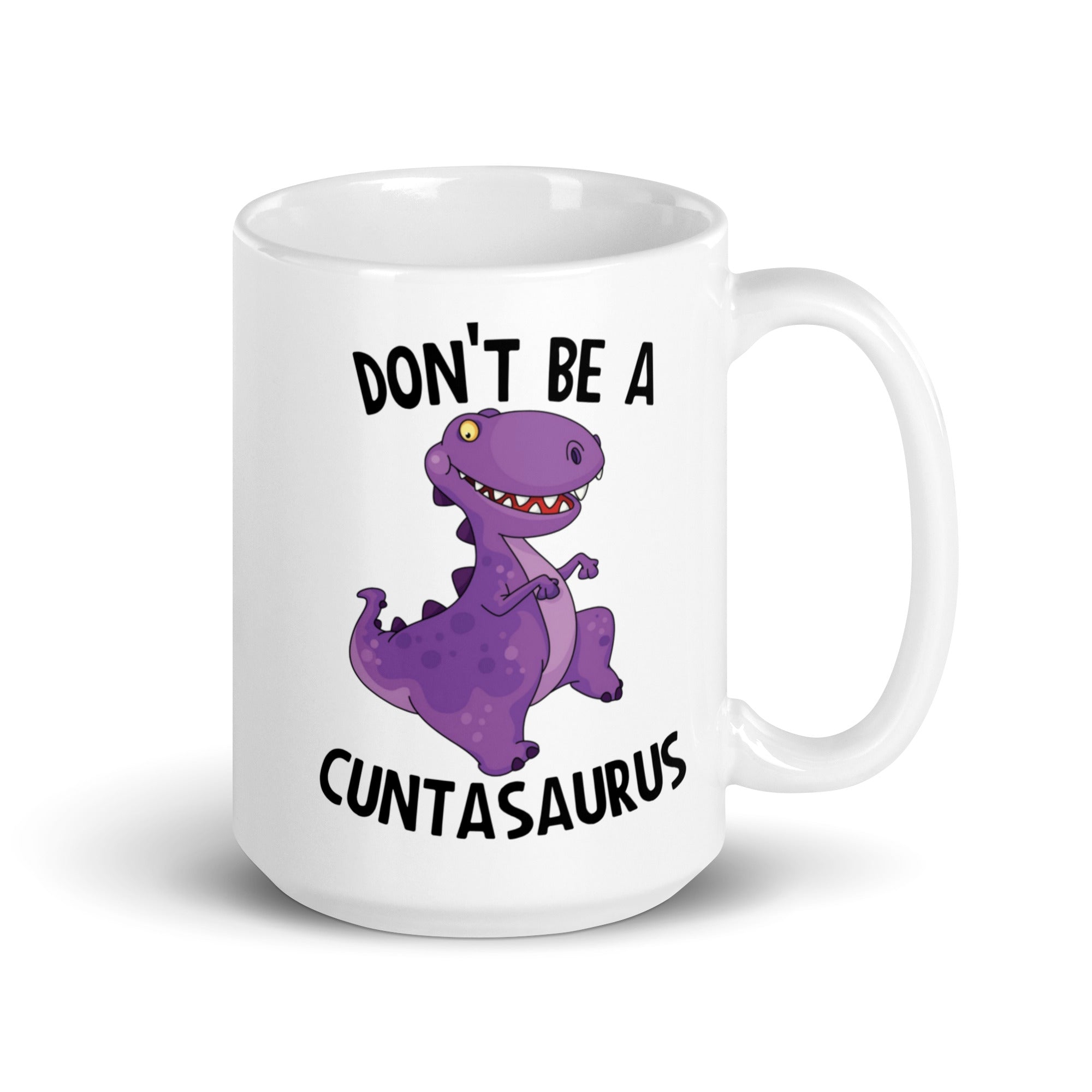 A glossy ceramic mug featuring the humorous phrase 'Don't Be A Cuntasaurus' printed on both sides, available in two sizes.