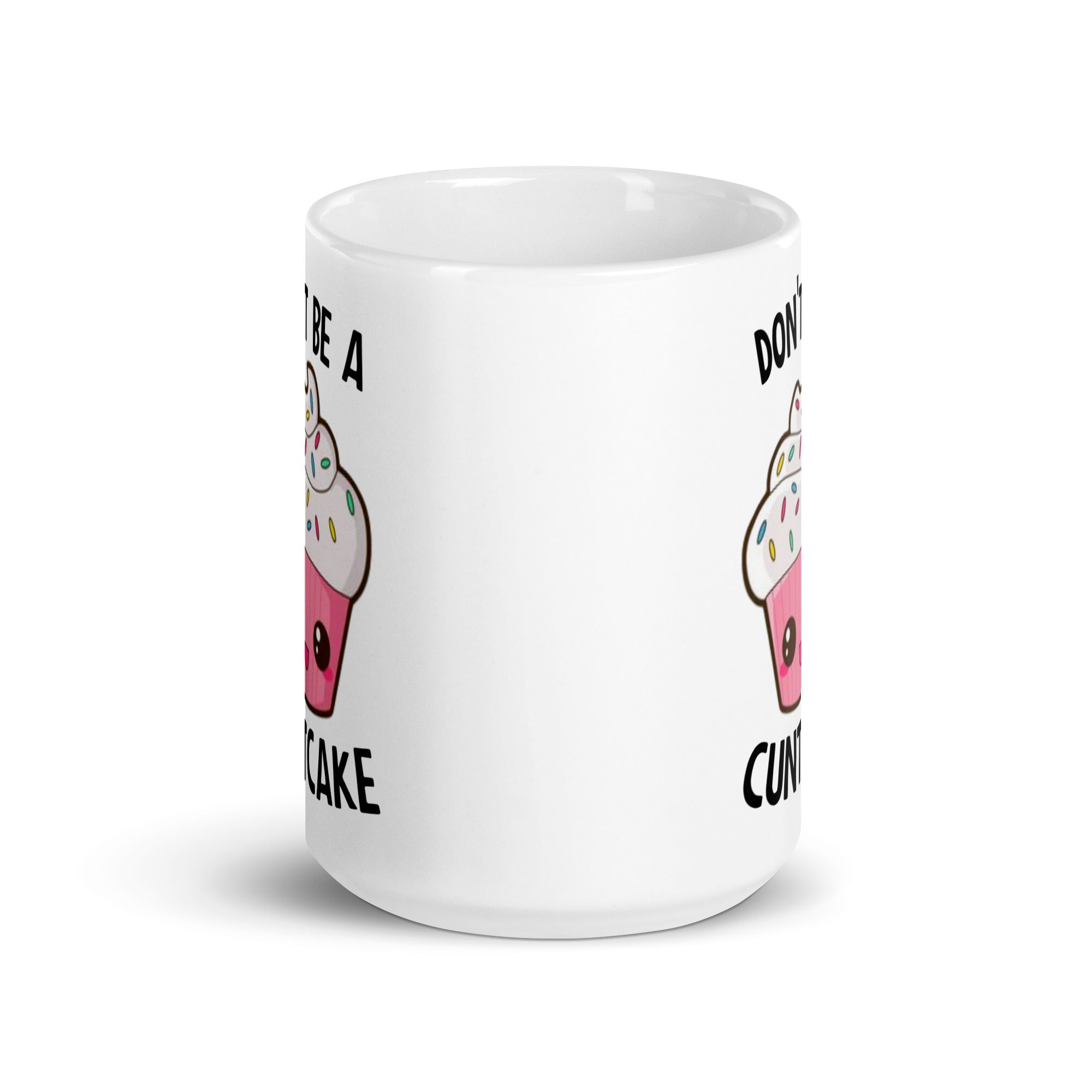 A glossy ceramic mug with the phrase 'Don't Be A Cuntcake' printed on both sides, available in two sizes.