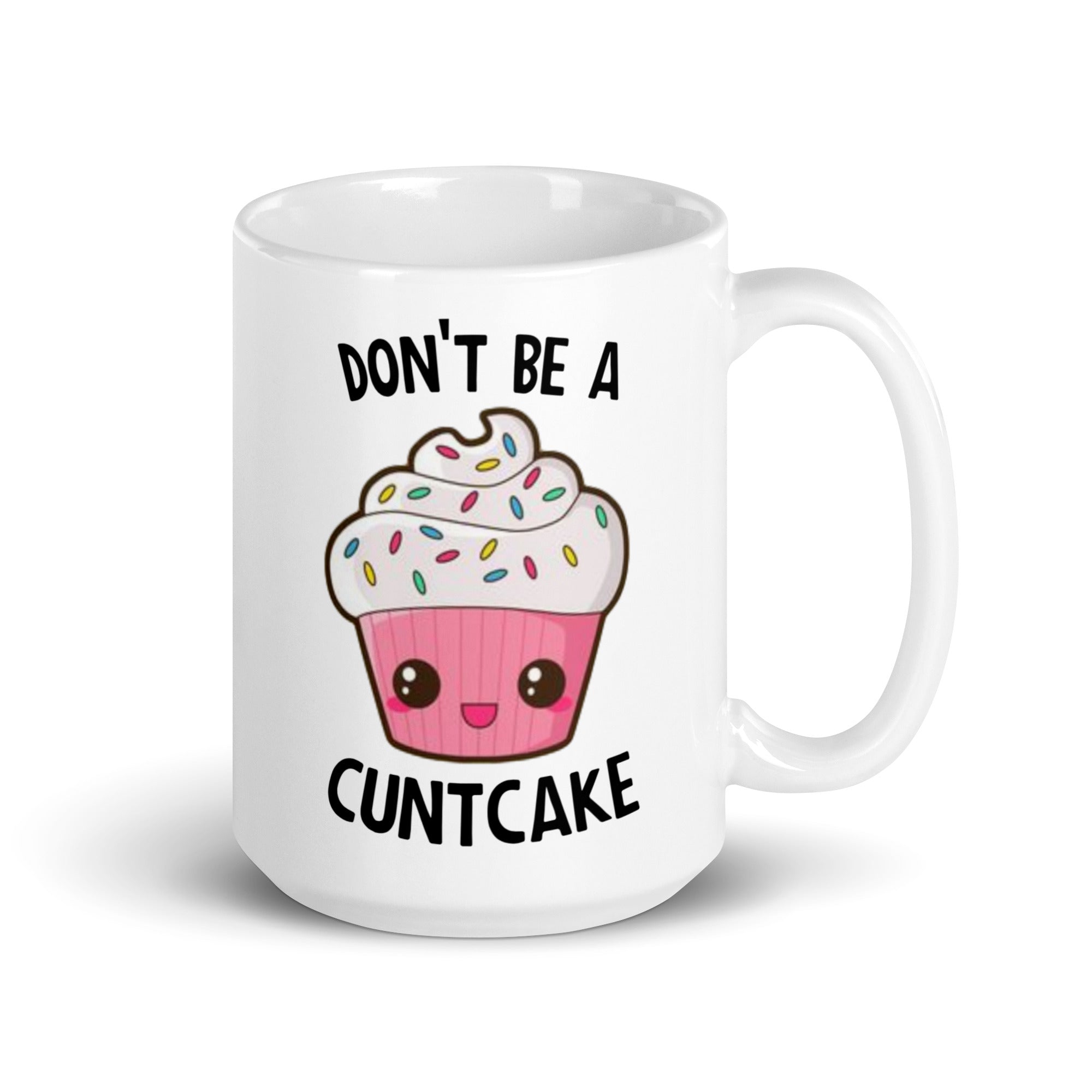 A glossy ceramic mug with the phrase 'Don't Be A Cuntcake' printed on both sides, available in two sizes.