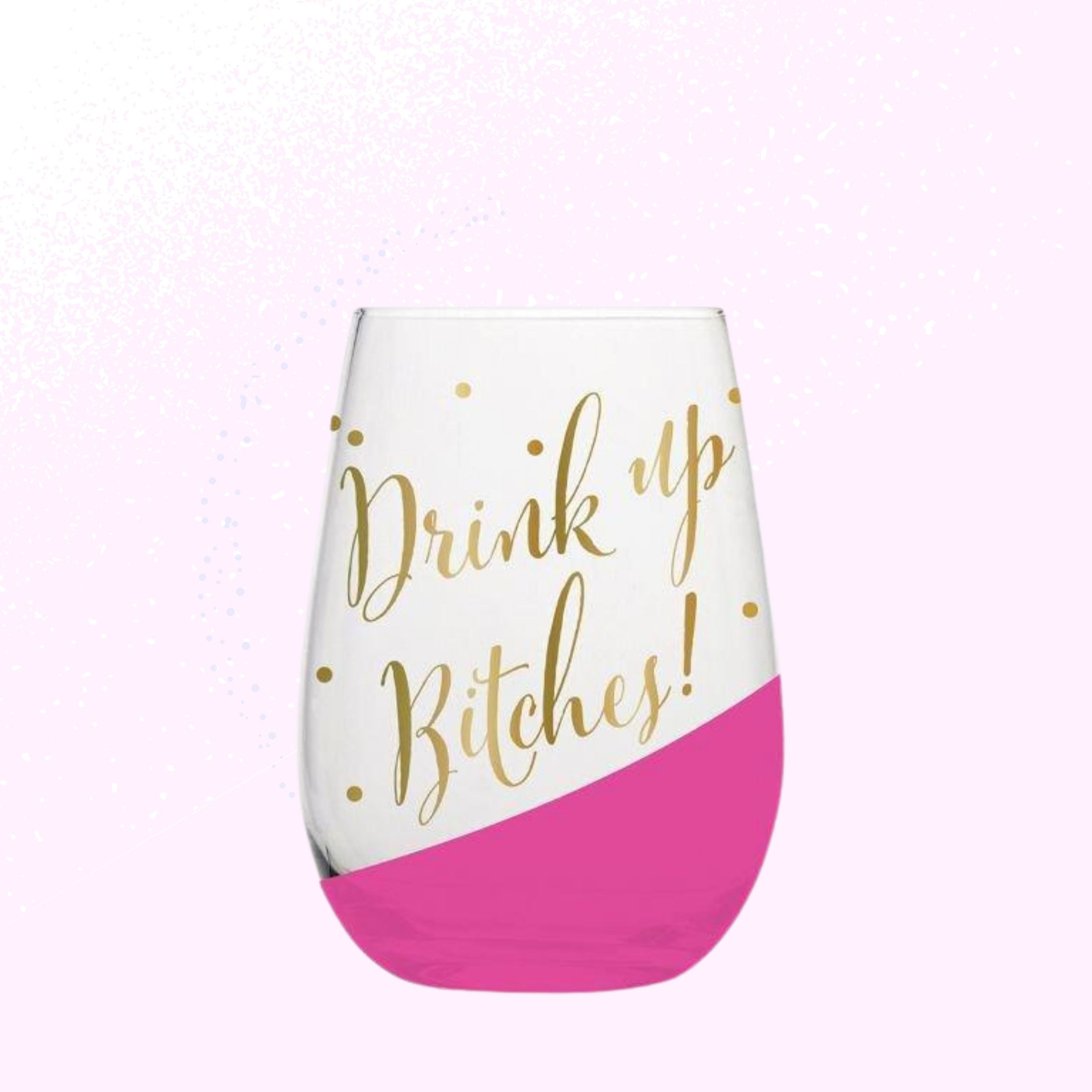 Stylish stemless wine glass with gold lettering saying 'Drink Up Bitches!' and pink slant detail, perfect for parties.