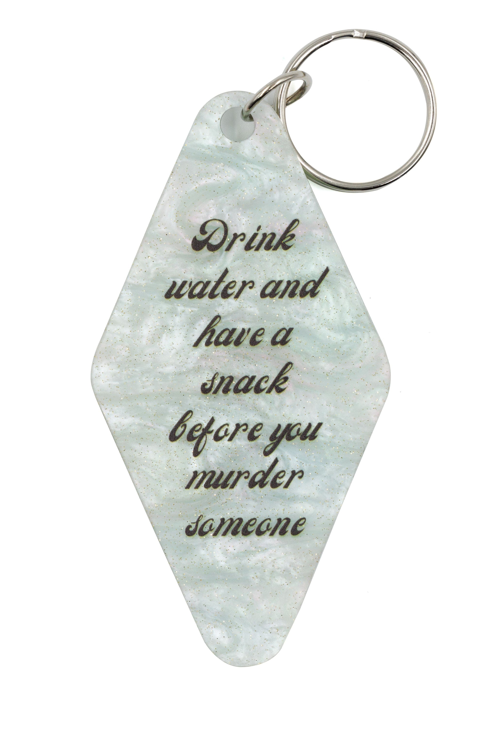 Marble mint keychain with humorous text, featuring a split ring for easy attachment.