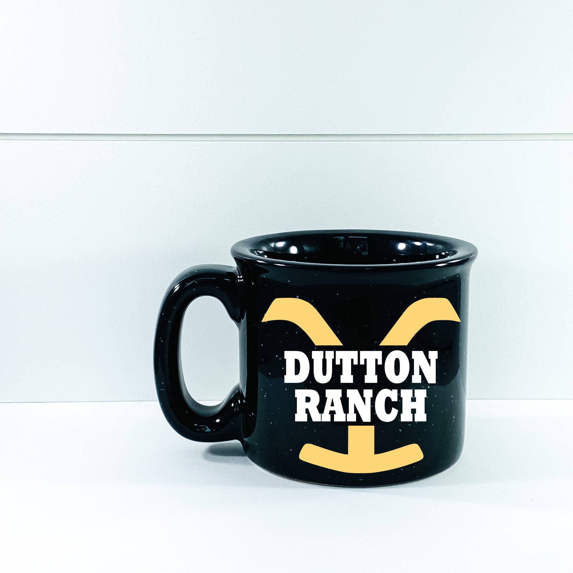 Dutton Ranch Campfire Mug with outdoor vinyl design, perfect for hot beverages.