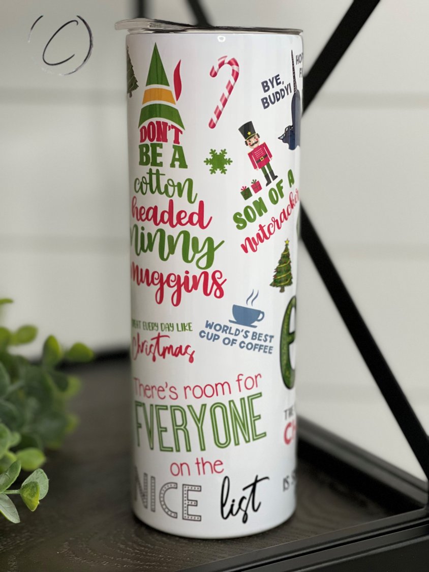 Elf 20oz Skinny Tumbler with vibrant design and reusable straw, perfect for hot and cold beverages.