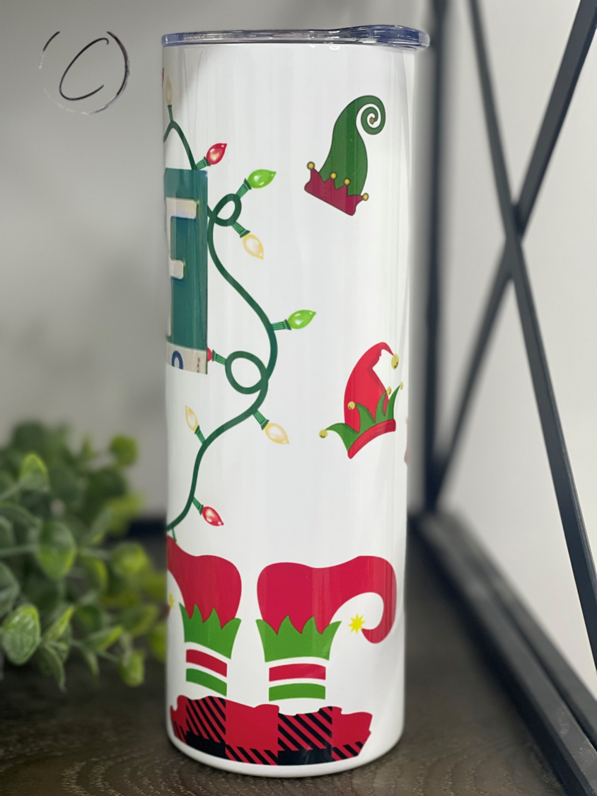 Elf Life 20oz Skinny Tumbler featuring a vibrant design, reusable straw, and durable construction for hot and cold beverages.