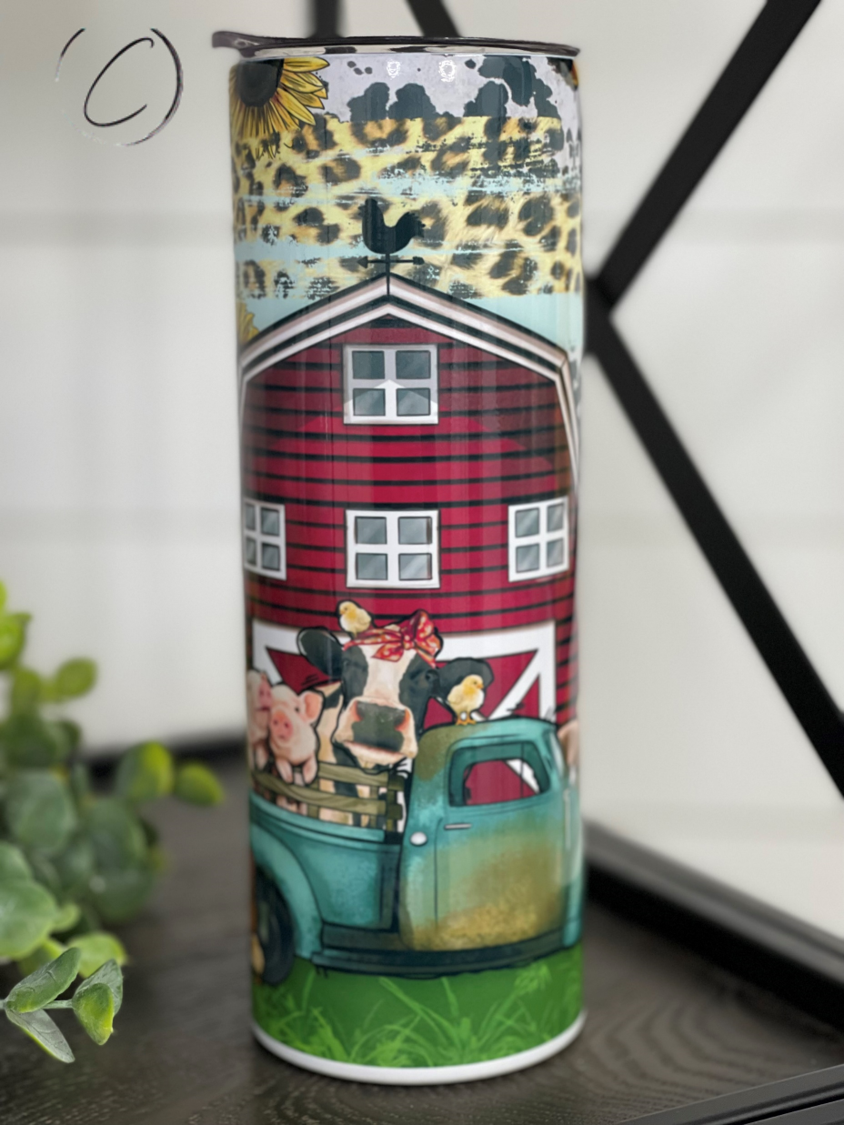 Farm Animal Truck 20oz Skinny Tumbler featuring vibrant farm animal designs, reusable straw, and durable construction.