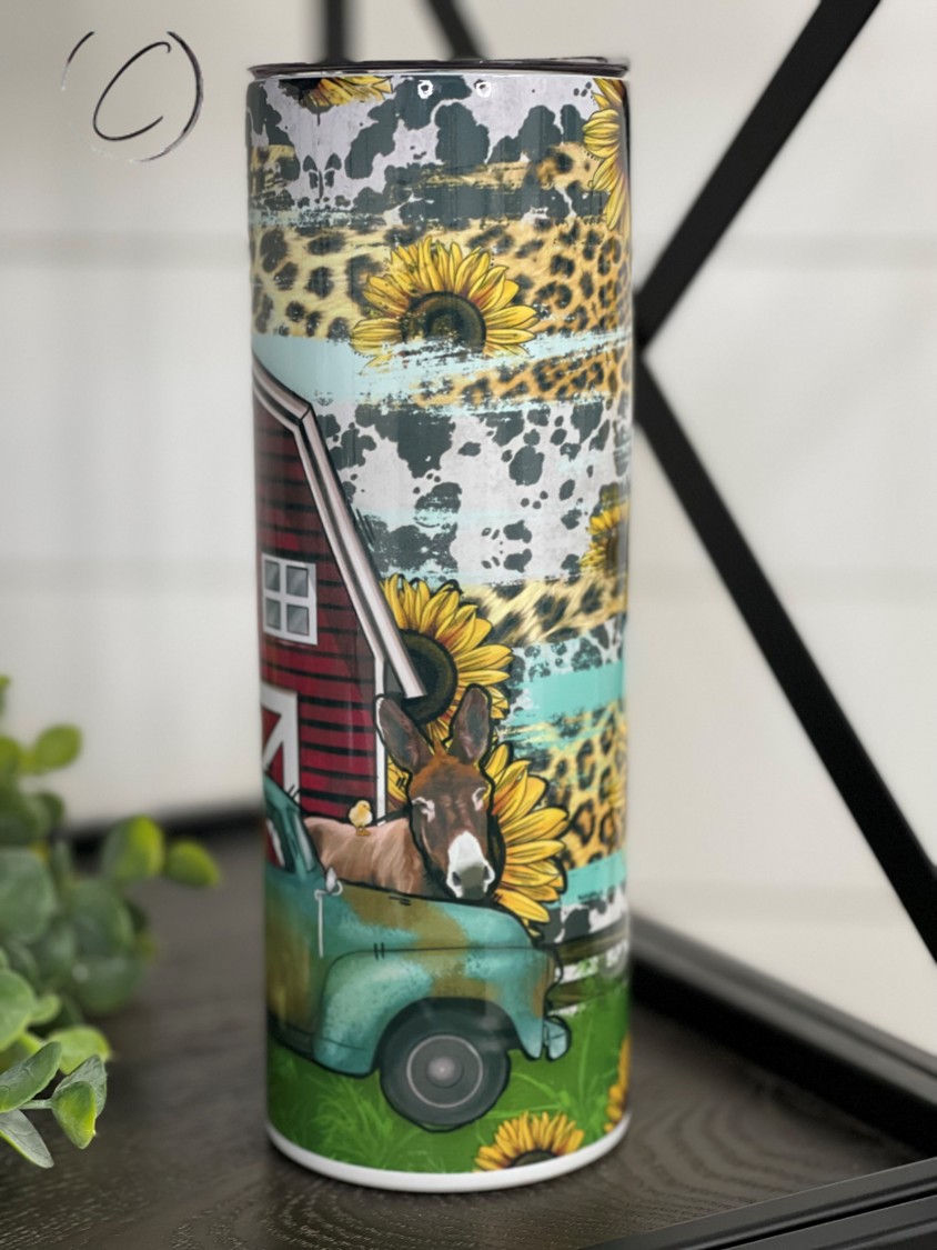 Farm Animal Truck 20oz Skinny Tumbler featuring vibrant farm animal designs, reusable straw, and durable construction.