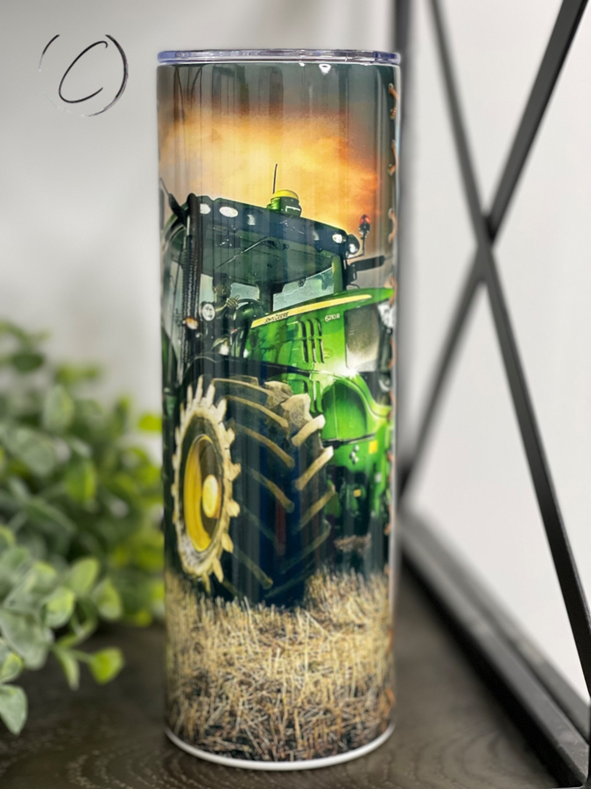 Farmer 20oz Skinny Tumbler with full wrap design and reusable straw, showcasing its durable and stylish features.