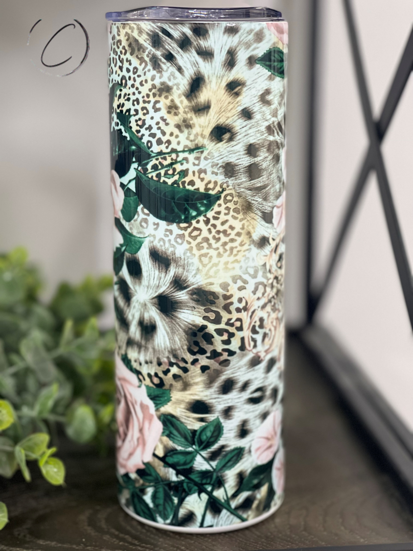 Feisty Floral 20oz Skinny Tumbler featuring a vibrant floral design, reusable straw, and durable construction.