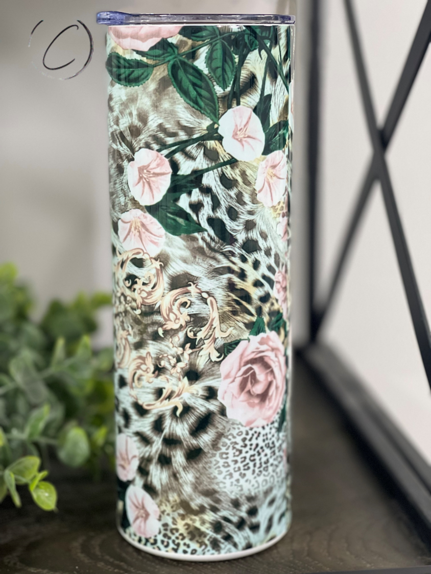 Feisty Floral 20oz Skinny Tumbler featuring a vibrant floral design, reusable straw, and durable construction.