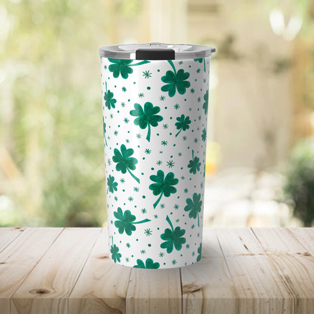 A stylish 20oz stainless steel travel mug featuring a vibrant four-leaf clover design, perfect for St. Patrick's Day celebrations.