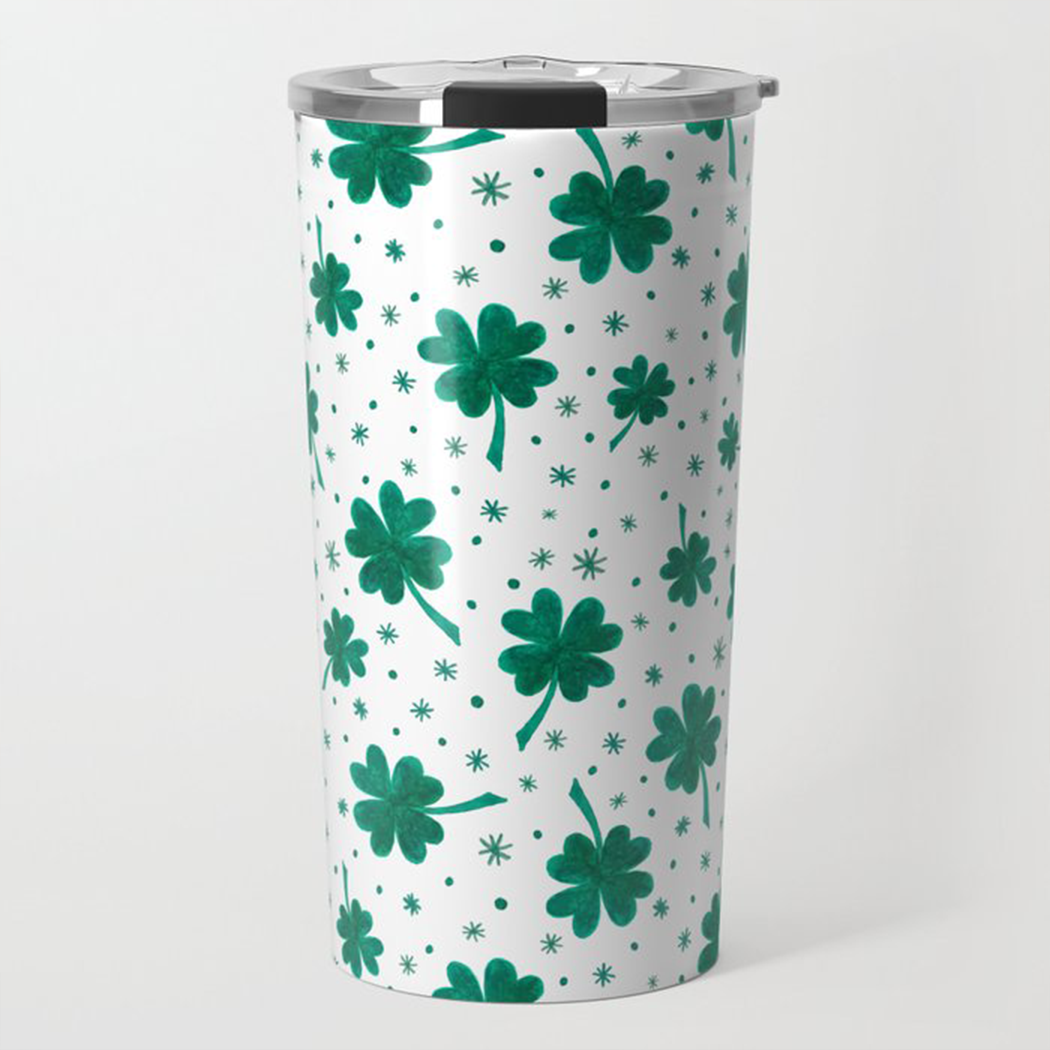 A stylish 20oz stainless steel travel mug featuring a vibrant four-leaf clover design, perfect for St. Patrick's Day celebrations.