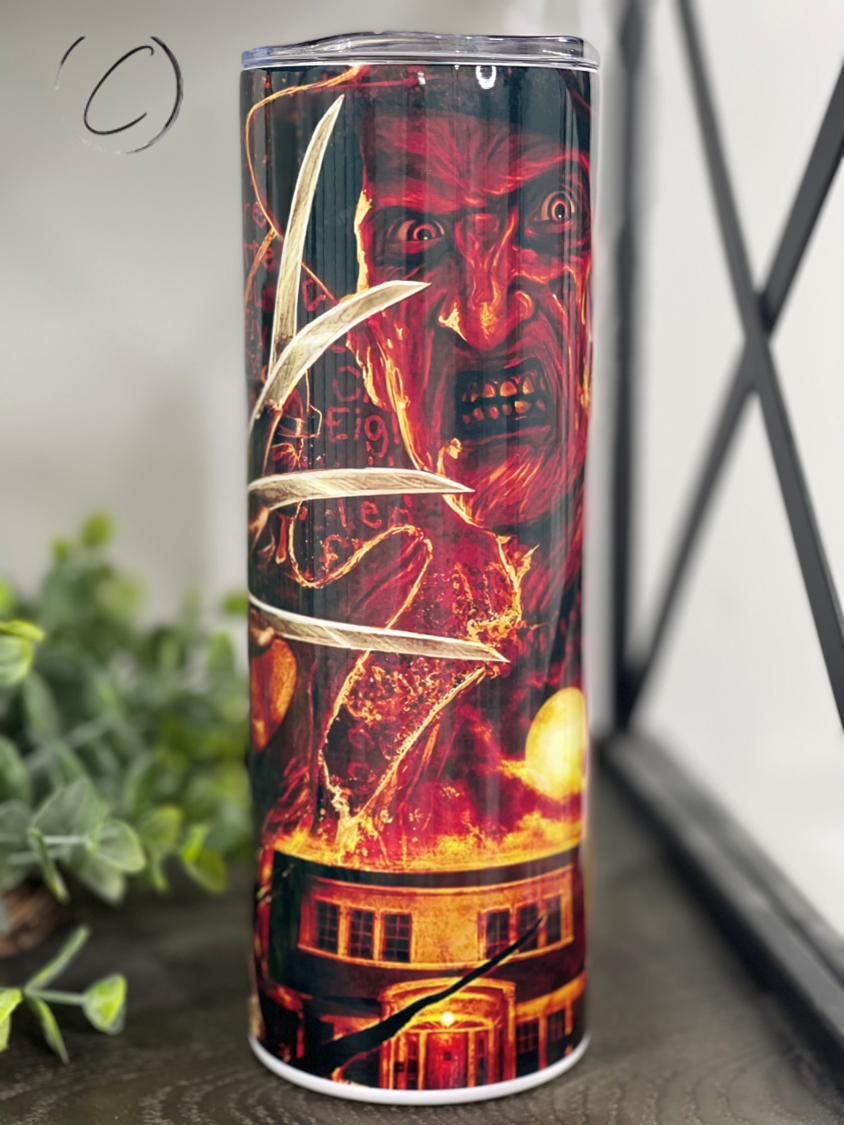 Freddy Krueger Bloody Paper 20oz Skinny Tumbler featuring a horror-themed design with a bloody paper motif.